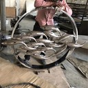 地產(chǎn)景觀不銹鋼魚群雕塑加工廠家