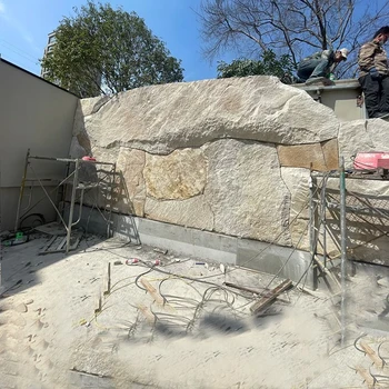 甘肅柏坡黃景墻廠家,天然柏坡黃不規(guī)則景墻加工制作