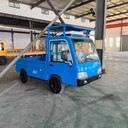 2噸電動平板貨車帶籃板廠區(qū)內(nèi)拉貨電瓶車電廠使用