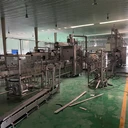 回收二手飲料設(shè)備收購破產(chǎn)大型乳制品設(shè)備果汁飲料灌裝機(jī)