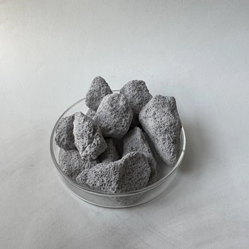 沂州鈣基脫氮除磷濾料人工濕地填料污水處理濾料生態(tài)池草溝填料