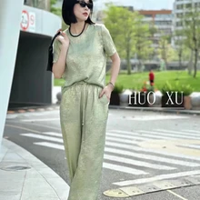 輕奢商務(wù)女裝或許春夏時尚新中式女裝直播女裝尾貨