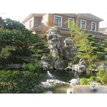 陜西漢中水泥假山公司學校假山現(xiàn)場施工
