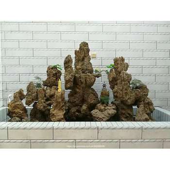 山東日照園林假山噴泉流水公司假山大門制作
