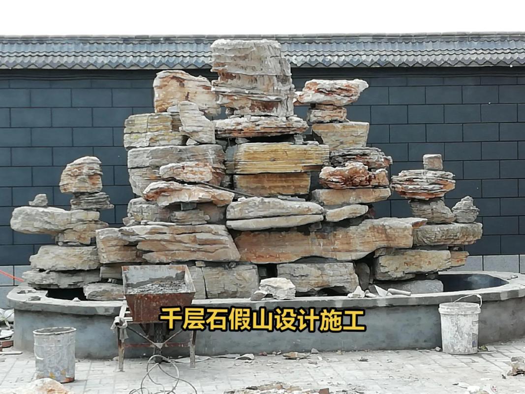 河北石家莊斧劈石假山安裝 學(xué)校假山現(xiàn)場(chǎng)施工