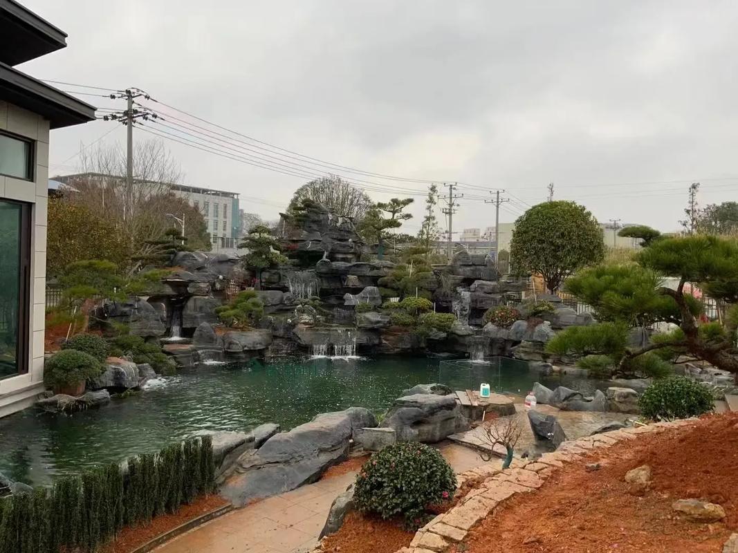 天津紅橋斧劈石假山安裝 大型園林假山制作