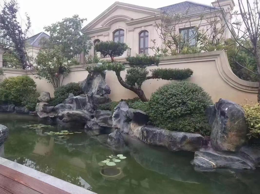 天津東麗水泥假山公司 別墅庭院魚池假山