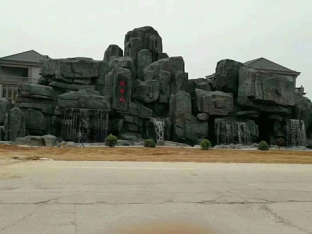 北京東城黃蠟石假山 公司假山大門制作